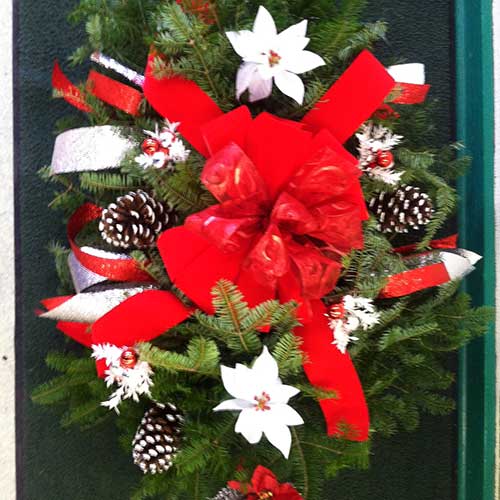 Christmas trees, poinsettias and festive holiday decor available at Tom Strain and Sons in Toledo, Ohio!